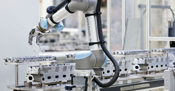 robot en un proceso de fabricación